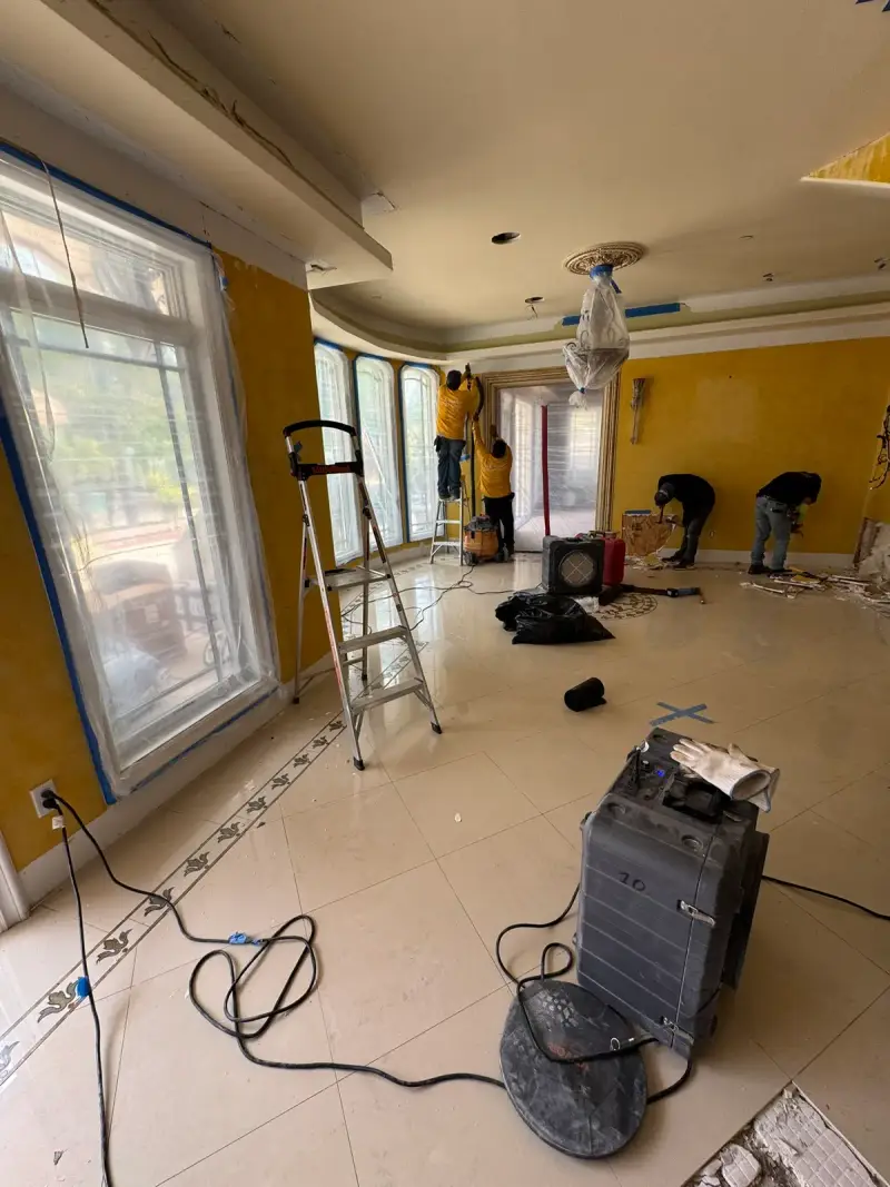 Water damage and extraction, Damage: Flooded room with water damage